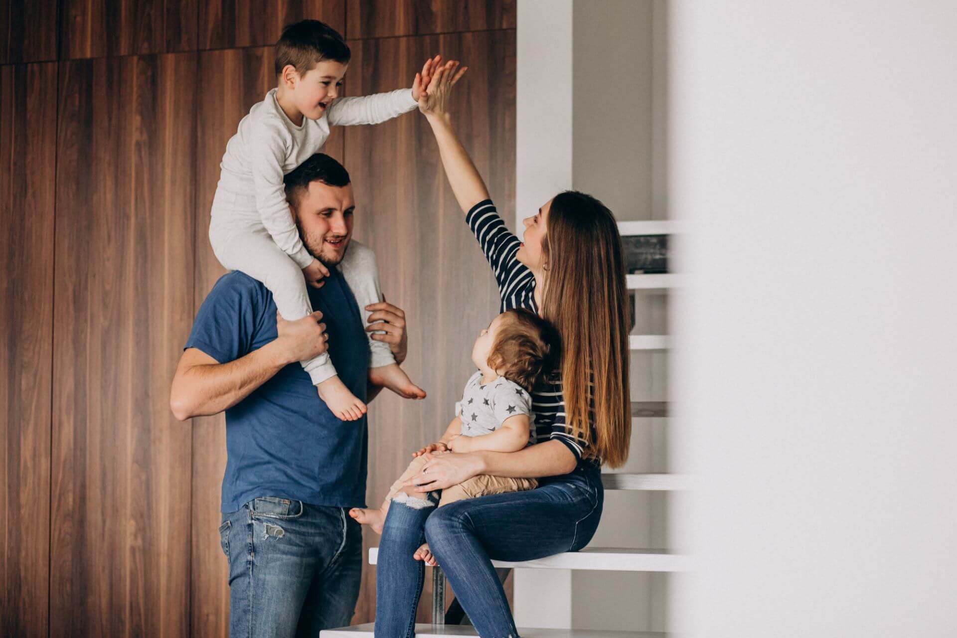 young-family-with-their-little-son-home-having-fun (1)